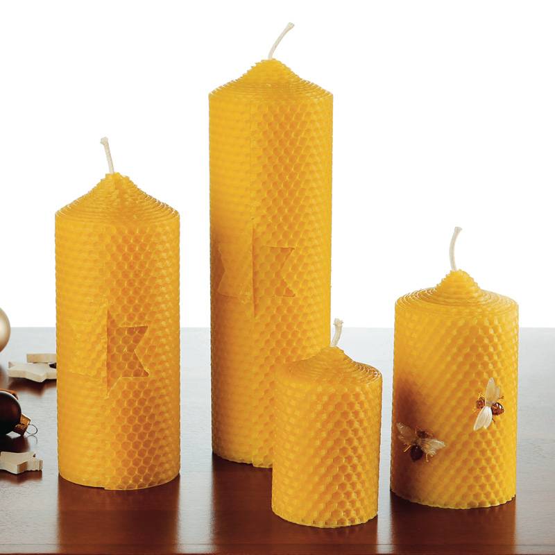 Schöne Kerze aus Bienenwachs mit Stern Kerze aus Bienenwachs mit Stern