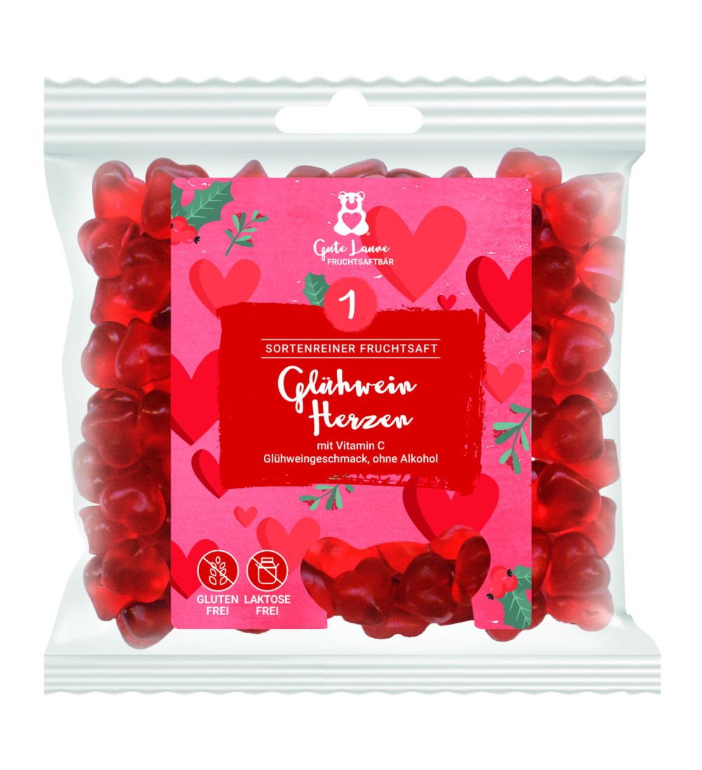 Cellophantüte mit Etikett gefüllt mit roten Glühweinherzen