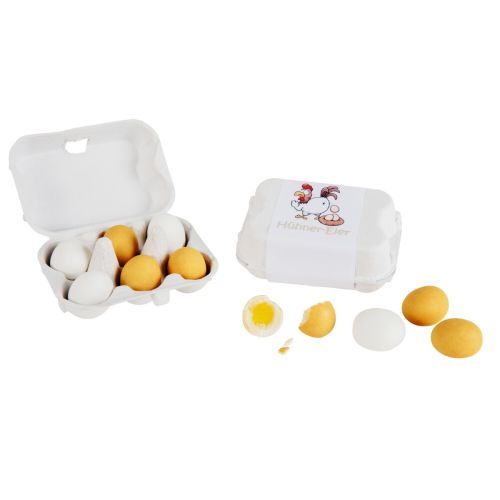 Sechs Marzipan-Hühnereier im Eierkarton