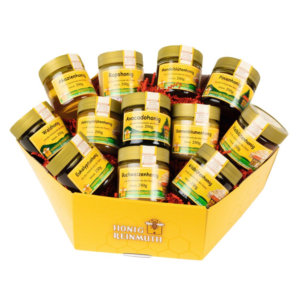Honig Vielfalt Geschenkbox Honig Vielfalt Geschenkbox mit verschiedenen Honigsorten in einer wabenförmigen Verpackung