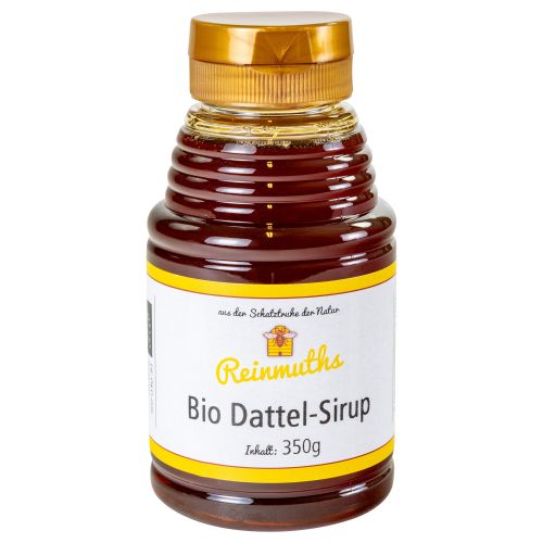 PET-Spenderflasche mit Etikett mit Bio-Dattel-Sirup gefüllt.