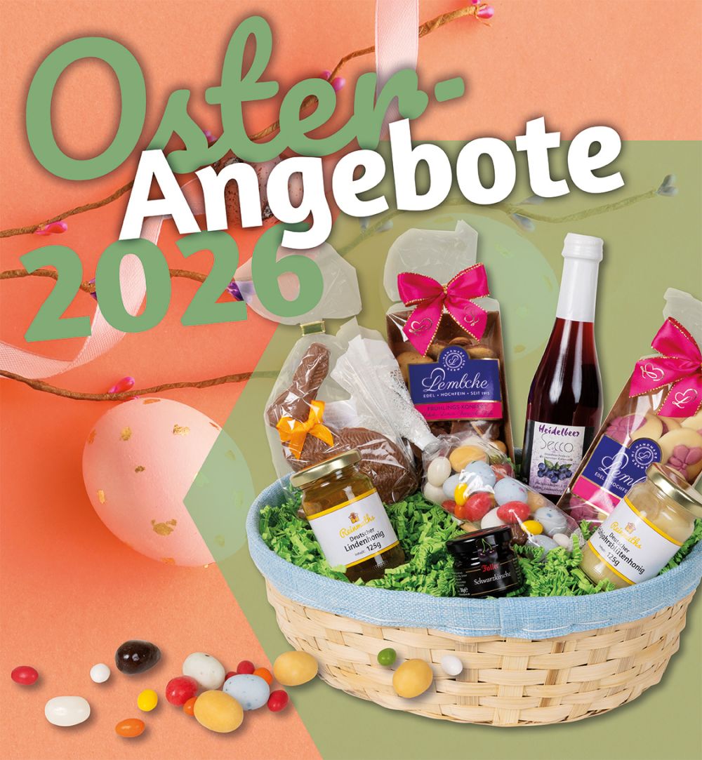 Geschenkkorb mit Osterprodukten vor einem Hintergrund mit Zweigen und Ostereiern