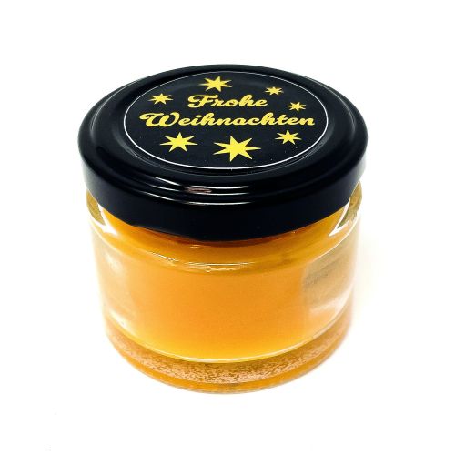 Kerze im Glas mit schwarzem Deckel mit Etikett