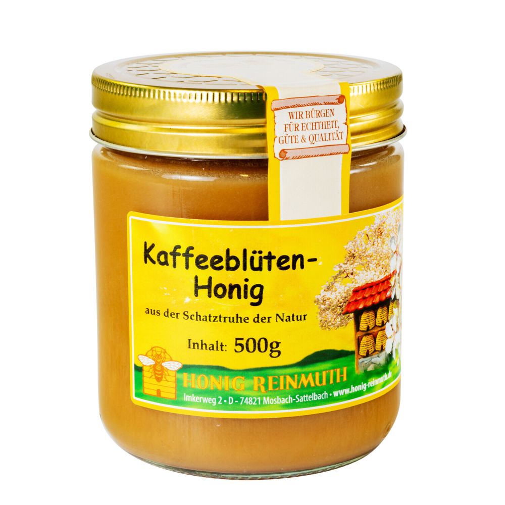 Glas mit goldenem Deckel und Etikett mit Banderole, gefüllt mit Honig