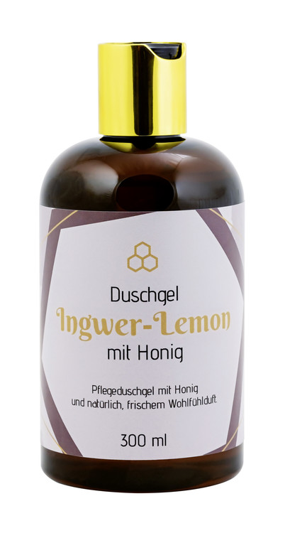 Braune Flasche mit goldenem Deckel und Etikett
