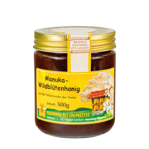Glas gefüllt mit Honig mit goldenem Deckel und Etikett mit Banderole über Deckel